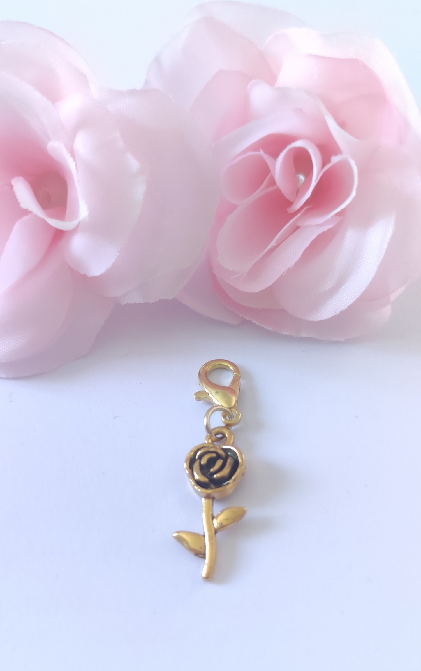 Charm rose avec fermoir