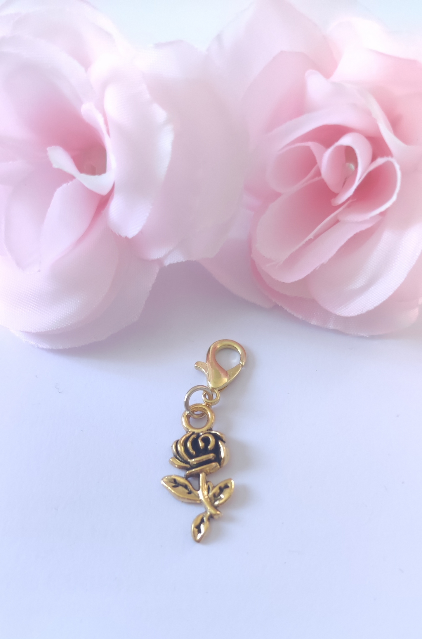 Charm rose avec fermoir