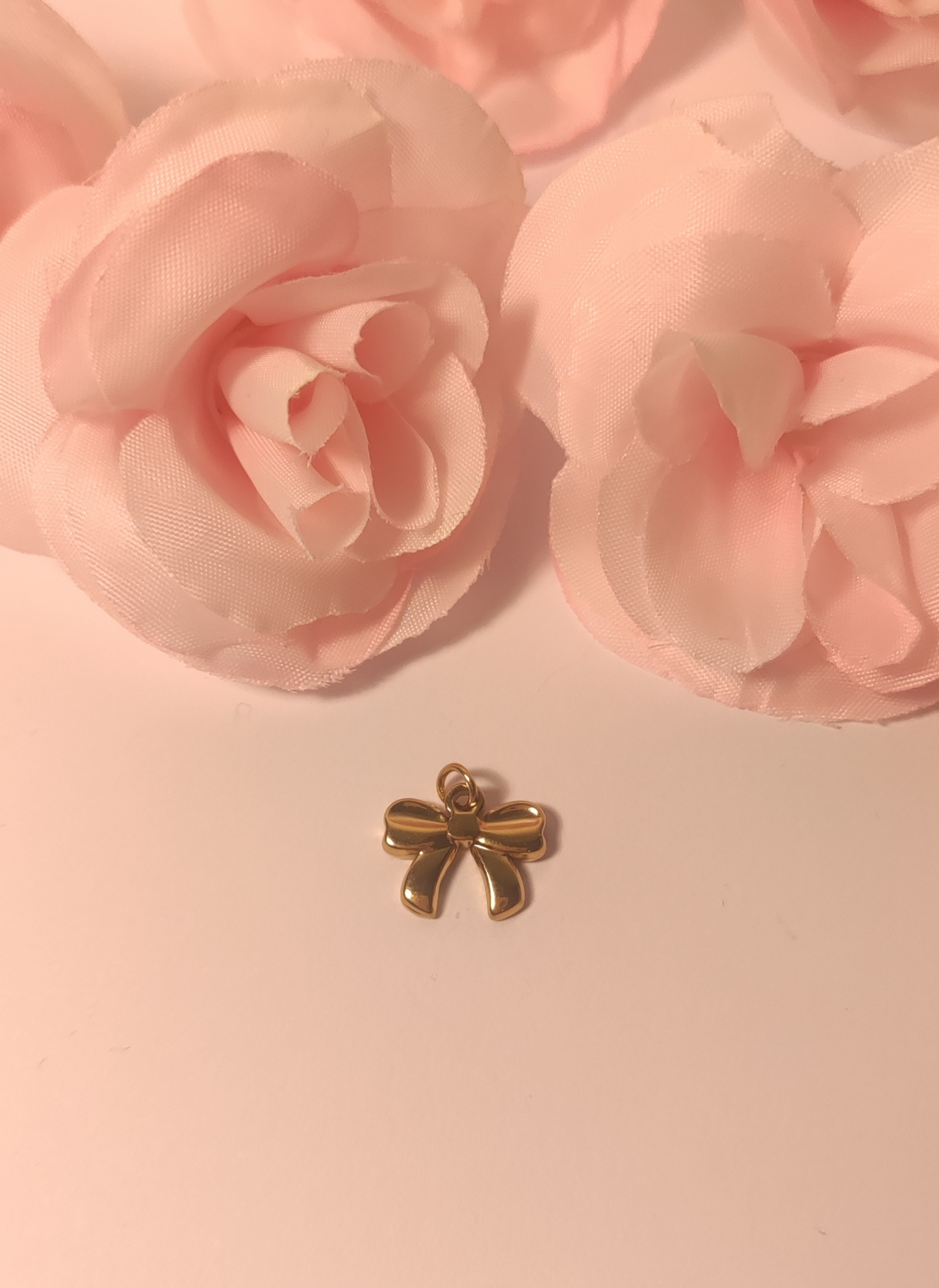 Charms petit nœud doré