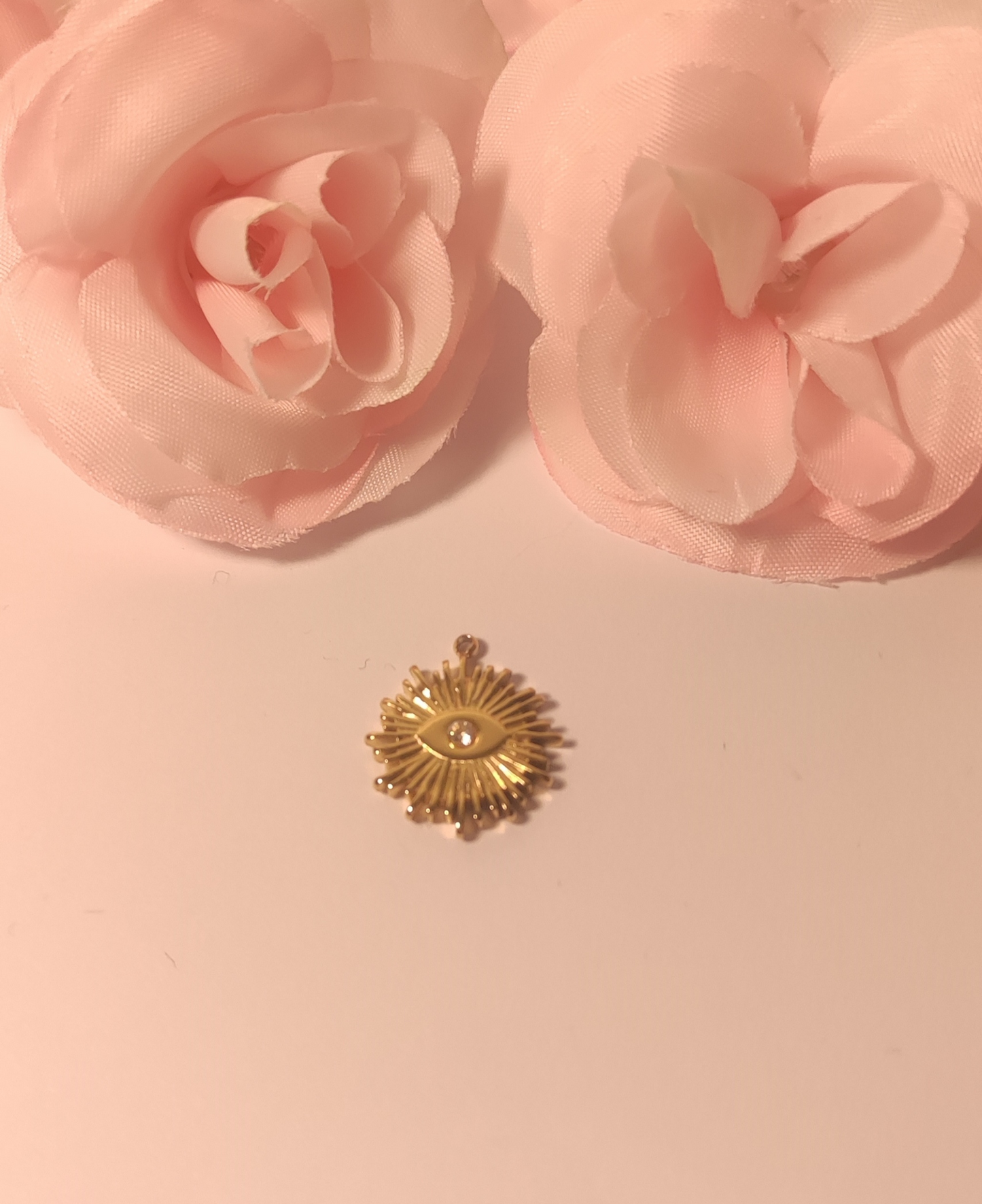 Charms rayon du soleil avec œil