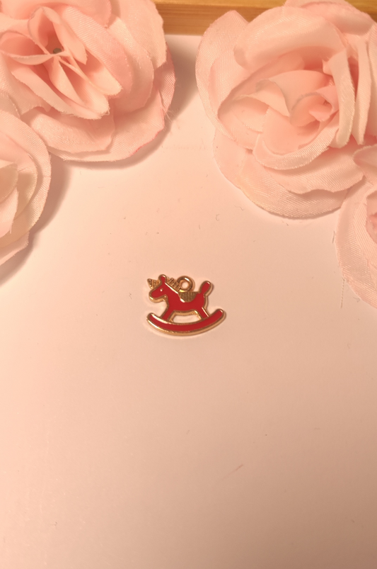 Charms cheval à bascule