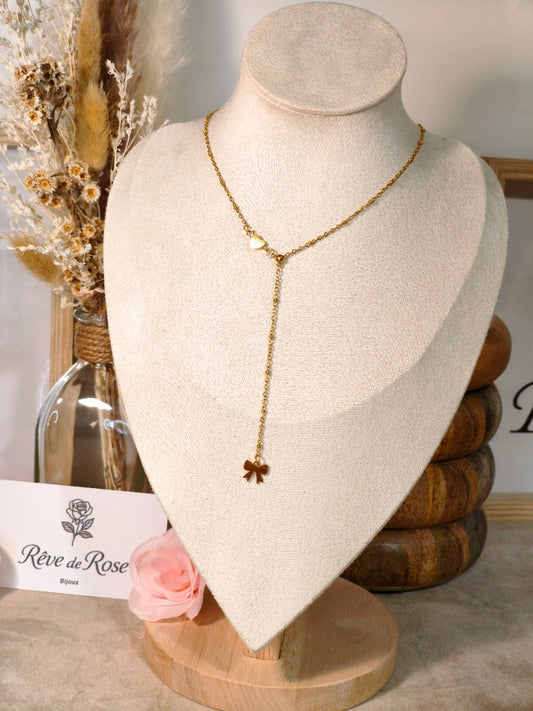 Collier doré Y avec petit cœur et un petit nœud doré en bas  - Rêve de Rose