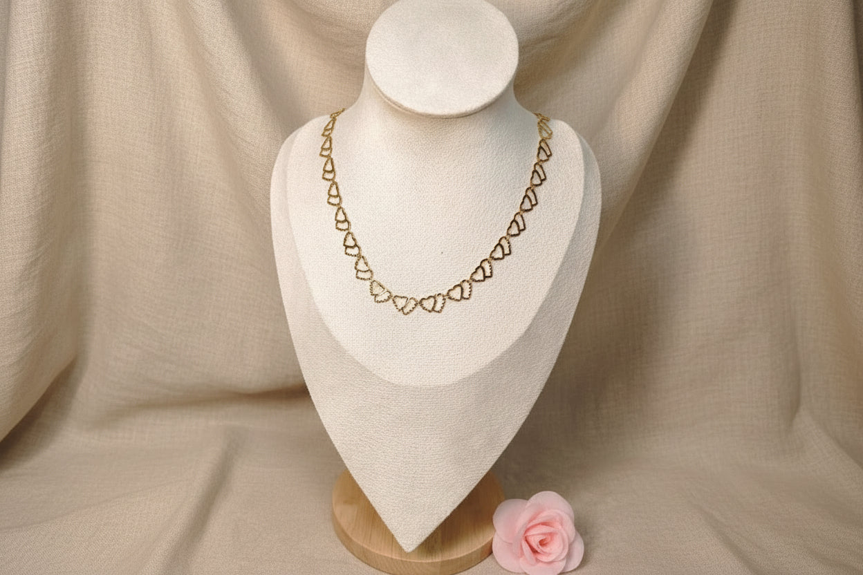Collier chaîne dorée de petits cœurs entrelacés - Rêve de Rose