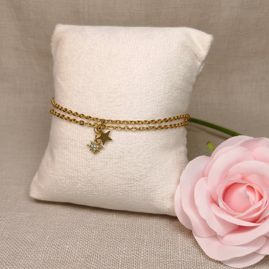 Bracelet double chaîne doré avec une  petite étoile scintillante et une petite étoile dorée - Rêve de Rose