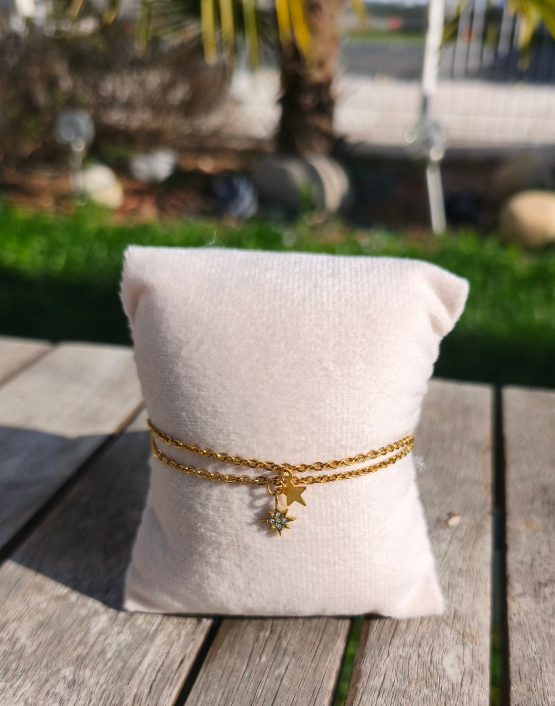 Bracelet double chaîne doré avec une  petite étoile scintillante et une petite étoile dorée - Rêve de Rose